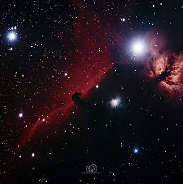 A captivating image of the Horsehead Nebula, a dark silhouette resembling the head of a horse against a vibrant backdrop of cosmic gases and dust. This celestial formation is located in the Orion constellation and is known for its striking shape and intricate textures, serving as a reminder of the breathtaking wonders that exist in the depths of the universe.