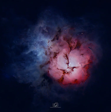 A captivating image of the Trifid Nebula, a stunning celestial formation located in the constellation of Sagittarius. The nebula exhibits a unique trifurcated appearance, with intricate swirls of gas and dust in vibrant shades of red, blue, and pink. This cosmic masterpiece showcases a blend of emission, reflection, and dark nebulae, providing a breathtaking glimpse into the celestial wonders that adorn our universe.