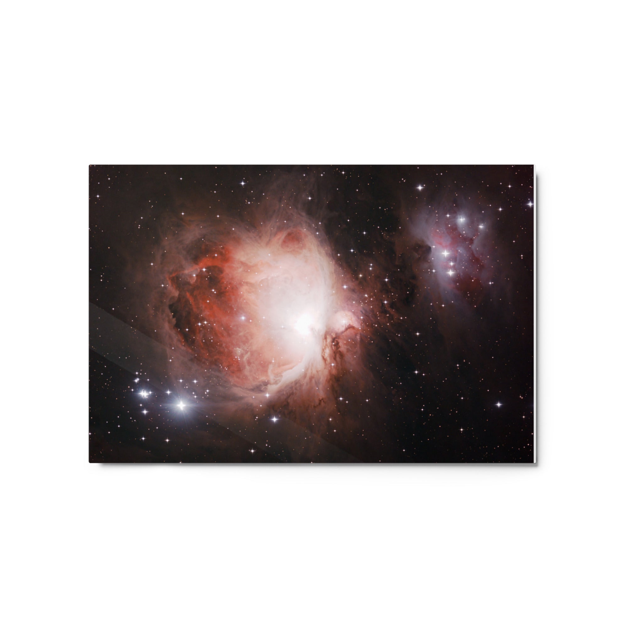 A stunning image of the Orion Nebula, a celestial cloud of gas and dust located in the Orion constellation. The nebula features vivid colors and intricate details, showcasing the birthplace of new stars amidst the vastness of space.